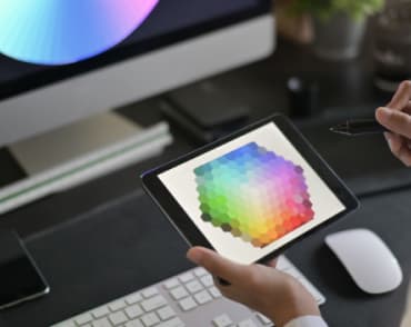 holding iPad